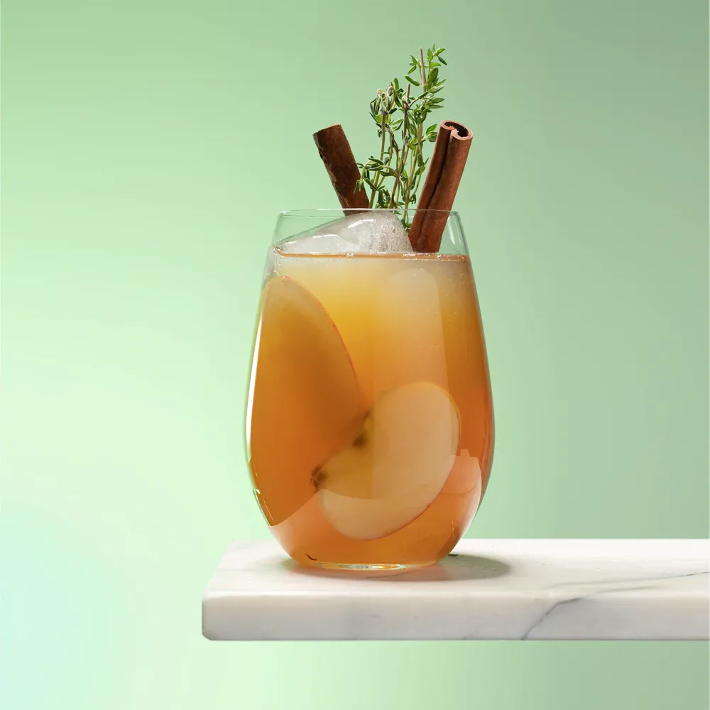 Apple cider sangria with a cinnamon stick