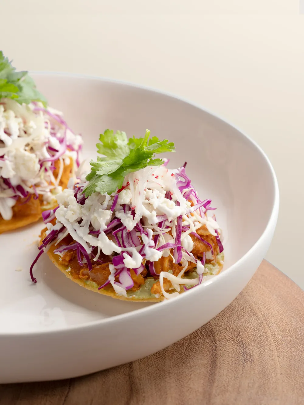 Chicken tostadas with slaw and queso fresco